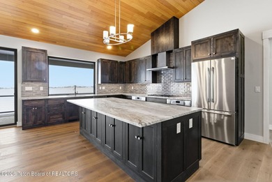 Surrounded by the natural beauty of Teton Valley, this - photo 15