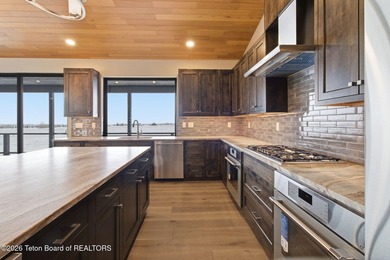 Surrounded by the natural beauty of Teton Valley, this - photo 16