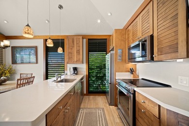 This is a leasehold property. Top-floor, end unit 1-bedroom - photo 8