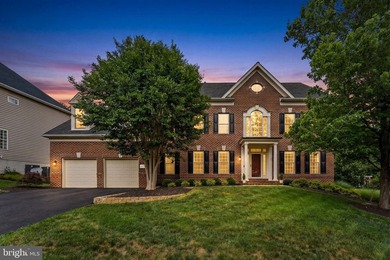 This incredible home is nestled within the premier gated - photo 1