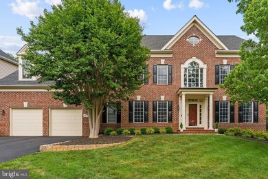 This incredible home is nestled within the premier gated - photo 2