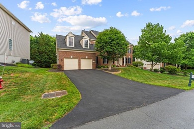 This incredible home is nestled within the premier gated - photo 3