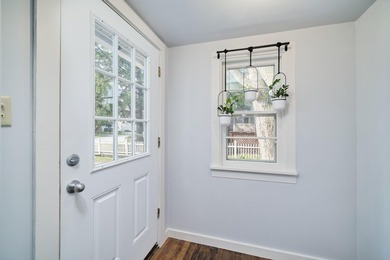 This charming duplex sits on a large lot with a privacy fenced - photo 3