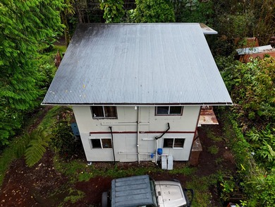 Nestled in the desirable Black Sand Beach area, this charming - photo 3