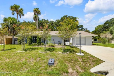 Welcome to this beautifully maintained Palm Coast home - photo 1