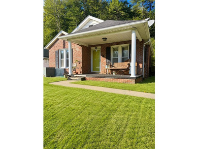 Charming 3-bedroom, 1-bath brick ranch offering the perfect - photo 1