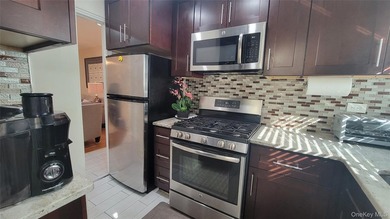 Welcome to this Garden style coop 3-story-brick building in the - photo 10