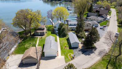 Dock your dreams on Big Cedar Lake! - Lake Home For Sale in West Bend, Wisconsin