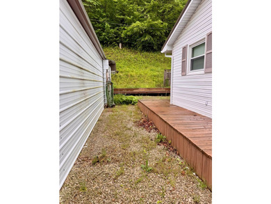 MOVE IN READY! Nice 2 bed 2 bath ranch sitting on 2 acres! This - photo 6