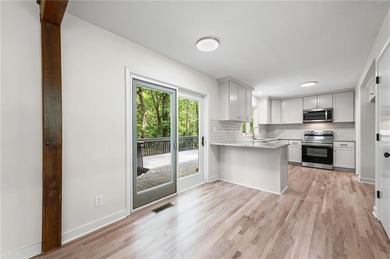 Beautiful modern home that has been completely updated with - photo 6