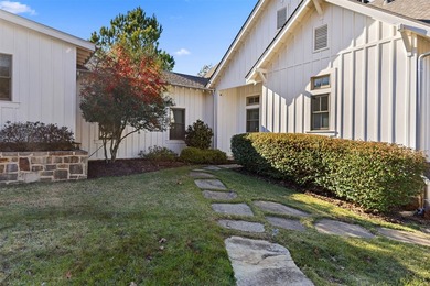 Experience elevated lakefront living in this furnished retreat - photo 3