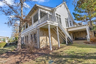 Experience elevated lakefront living in this furnished retreat - photo 5
