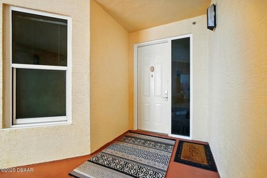 MOTORIZED HURRICANE SHUTTERS! Beautiful end unit condo with - photo 3