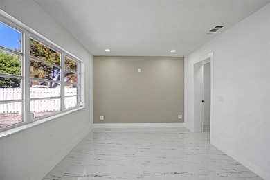 Completely renovated 4-bedroom, 3-bathroom home in desirable - photo 11