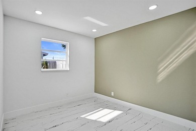 Completely renovated 4-bedroom, 3-bathroom home in desirable - photo 17