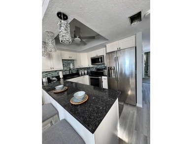 Perched over the sparkling waters of Charlotte Harbor, this bold - photo 21