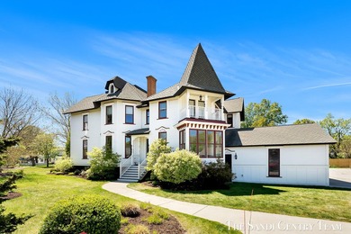 Welcome home to this beautifully renovated Victorian in the - photo 3