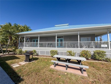 Perched over the sparkling waters of Charlotte Harbor, this bold - photo 36