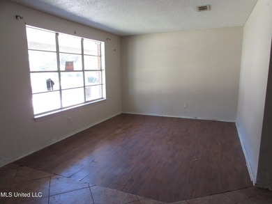 Large 4bdrm 2.5 bath home with newer roof. It is a fixer home - photo 7