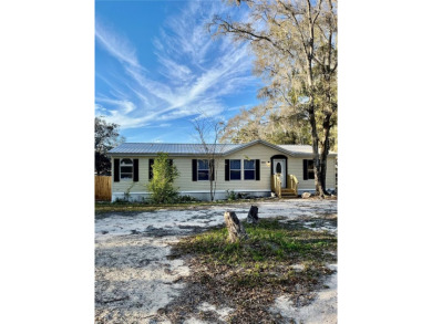 Lake Home For Sale in Trenton, Florida