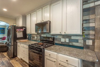 Welcome to coastal living at its finest in the heart of - photo 3