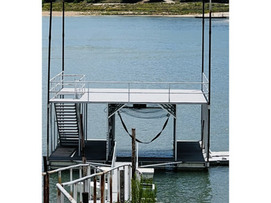 Escape to the lake in this beautifully remodeled, fully - photo 1
