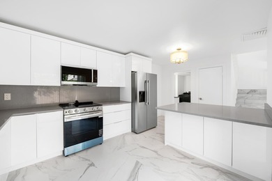 Beautifully renovated corner-unit townhome featuring 2 bedrooms - photo 2