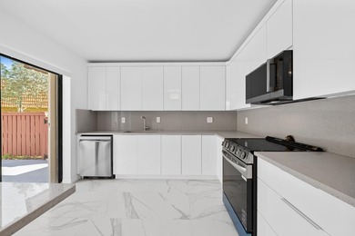 Beautifully renovated corner-unit townhome featuring 2 bedrooms - photo 3