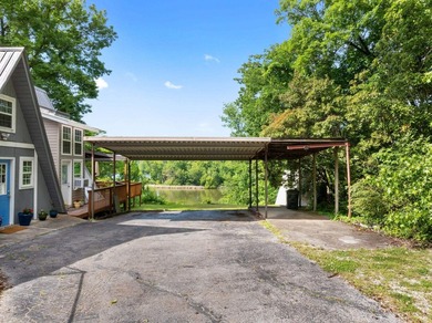 Perched atop a scenic hill with breathtaking water views, this - photo 2