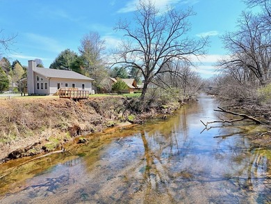 Tucked along the gentle banks of the Hiwassee River and just - photo 3