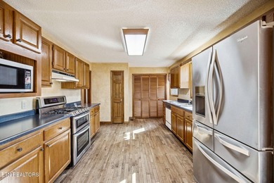 Set on 5.6 private, wooded acres, this well-maintained 3-bedroom - photo 4