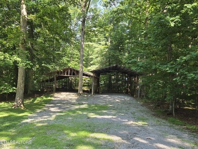 Set on 5.6 private, wooded acres, this well-maintained 3-bedroom - photo 7