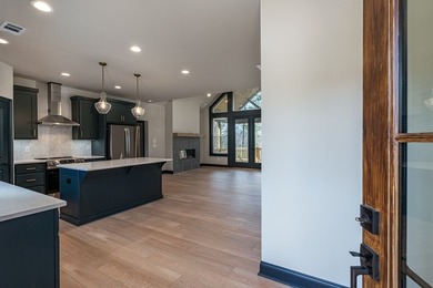 BRAND NEW HOME IN UPSCALE GATED COMMUNITY WITH RIVER ACCESS - photo 4