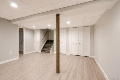 Welcome to this completely updated, modern split-level home in - photo 17