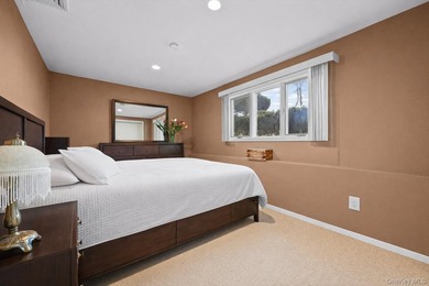 Waterfront high ranch offering 4 bedrooms and 2 full baths, set - photo 18