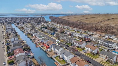 Waterfront high ranch offering 4 bedrooms and 2 full baths, set - photo 30