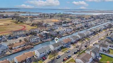 Waterfront high ranch offering 4 bedrooms and 2 full baths, set - photo 31