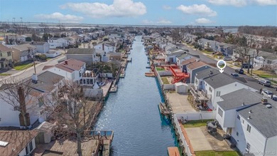 Waterfront high ranch offering 4 bedrooms and 2 full baths, set - photo 32