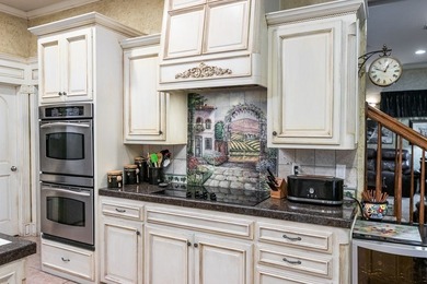 This stunning five-bedroom home in the heart of Bentwood Country - photo 10