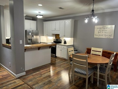 This home is immaculate inside and out. Beautiful open dining - photo 12
