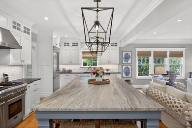 Where home and horizon merge, this waterfront estate on - photo 15