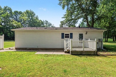 Move-in ready peace and tranquility await you! Situated on a - photo 15
