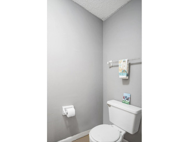 Nestled in the tranquil Seagrass Condominiums, this first-floor - photo 15