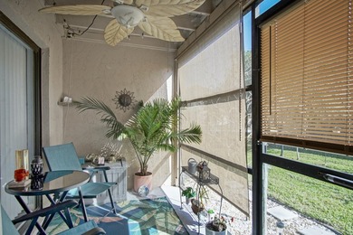 Nestled in the tranquil Seagrass Condominiums, this first-floor - photo 17