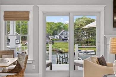 Where home and horizon merge, this waterfront estate on - photo 21