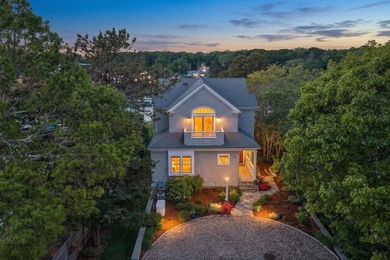 Where home and horizon merge, this waterfront estate on - photo 33