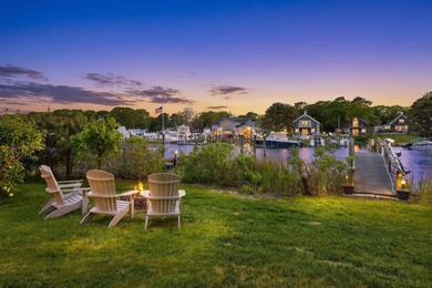 Where home and horizon merge, this waterfront estate on - photo 35