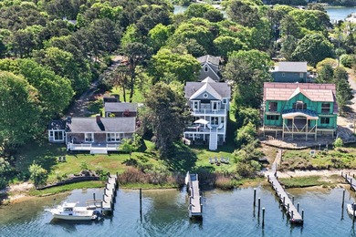 Where home and horizon merge, this waterfront estate on - photo 36
