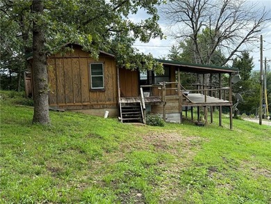 Nestled just minutes from the boat ramp near the beloved Lake of - photo 2