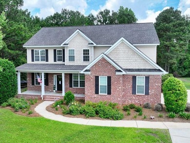 Welcome home to this beautiful custom brick 5-bedroom, 3-bath - photo 1
